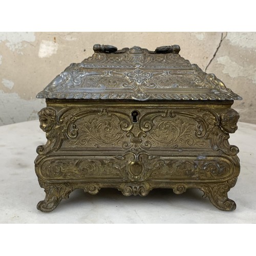 158 - AN ANTIQUE BRASS JEWELLERY BOX