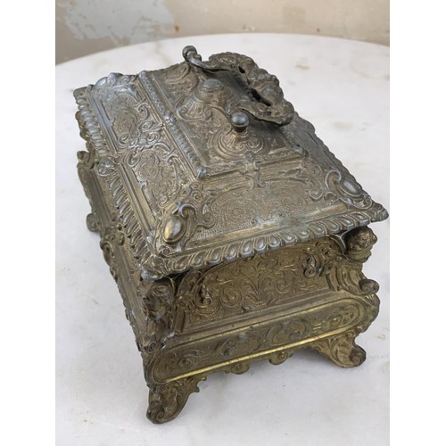 158 - AN ANTIQUE BRASS JEWELLERY BOX