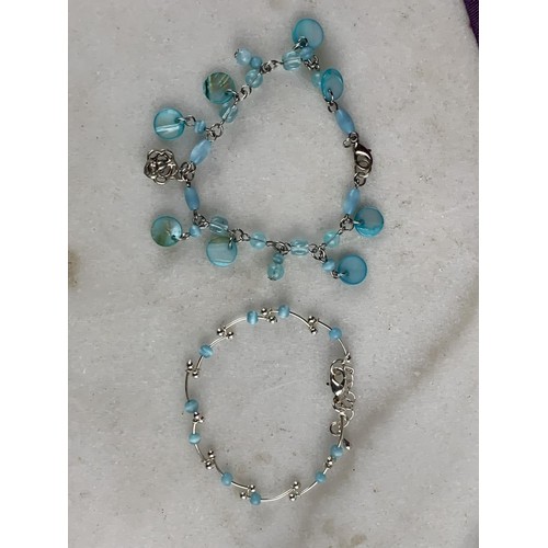 252 - 2 TURQUOISE COLOURED BRACELETS