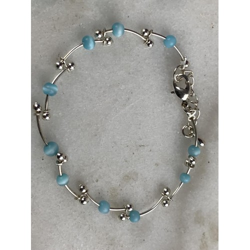 252 - 2 TURQUOISE COLOURED BRACELETS