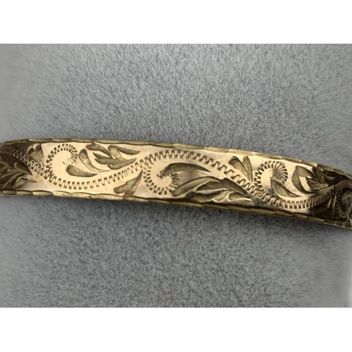 270 - 9ct R.G ENGRAVED BANGLE