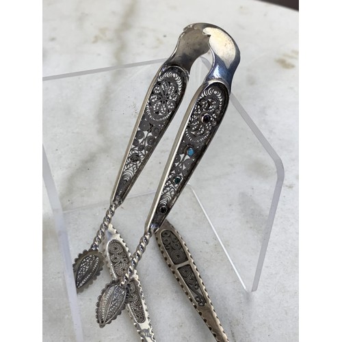 272 - A VERY ORNATE SILVER FILIGREE SUGAR TONGS SET WITH GARNET,TURQUOISE &EMERALD AND SILVER FILIGREEHAND... 