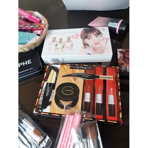 180 - A BOX OF NEW MAKEUP ITEMS