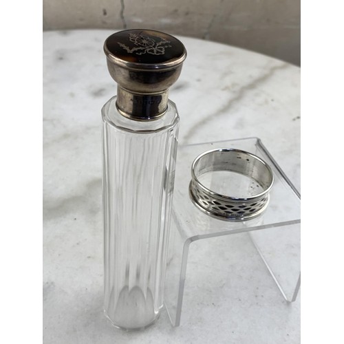 278 - A SILVER NAPKIN RING AND A SILVER & TORTOISE SHELL TOPPED BOTTLE