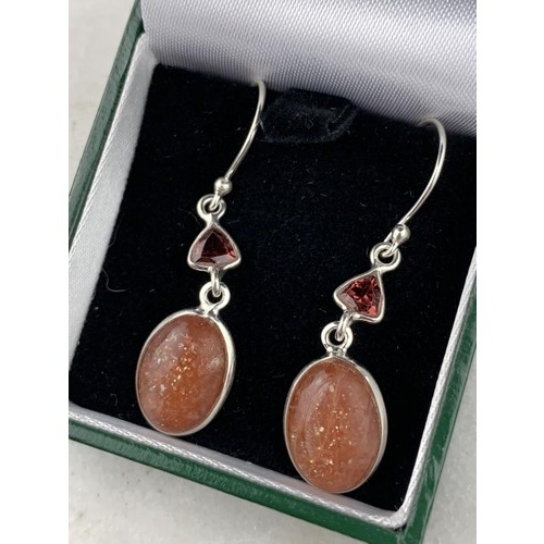 283 - A PAIR OF SILVER TOPAZ AND DROP EARRINGS