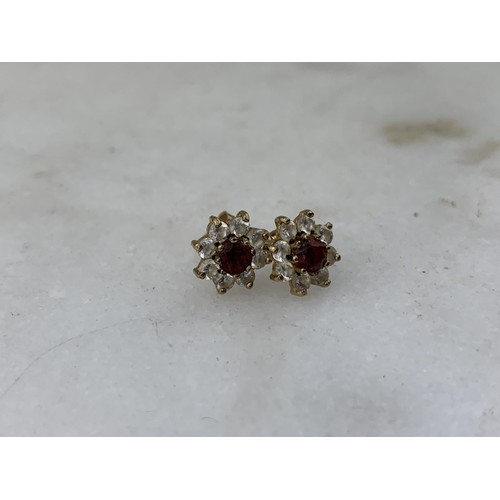 285 - A PAIR OF 9ct GOLD GARNET AND CRYSTAL EARRINGS