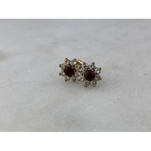 285 - A PAIR OF 9ct GOLD GARNET AND CRYSTAL EARRINGS