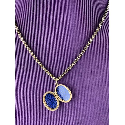 293 - A 9ct BACK AND FRONT OVAL LOCKET ON YELLOW METAL CHAIN