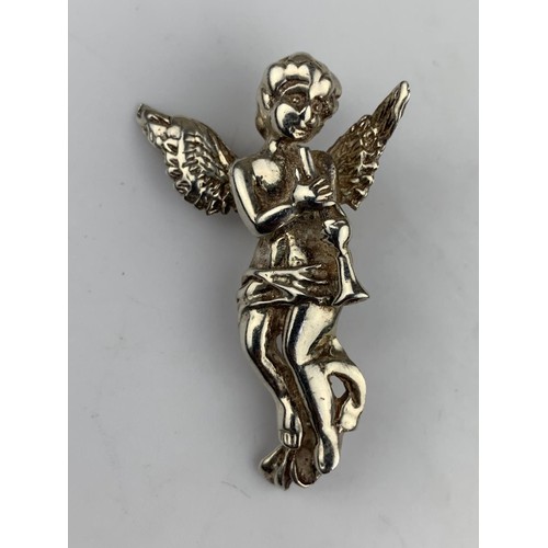 295 - A LARGE SILVER CHERUB BROOCH