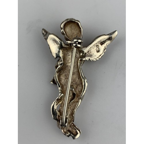 295 - A LARGE SILVER CHERUB BROOCH