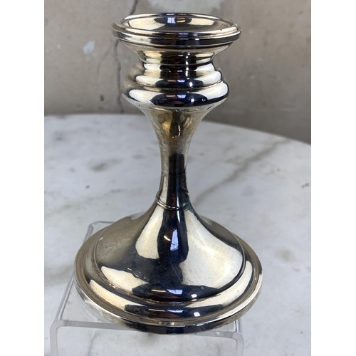 297 - A SILVER CANDLESTICK