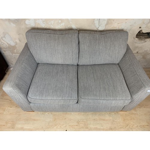 314 - A GREY 2 SEATER SETTEE