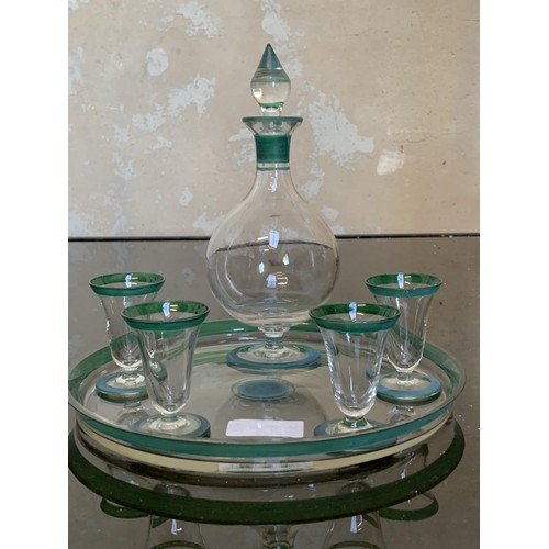 333 - A GLASS TRAY DECANTER AND 4 GLASS