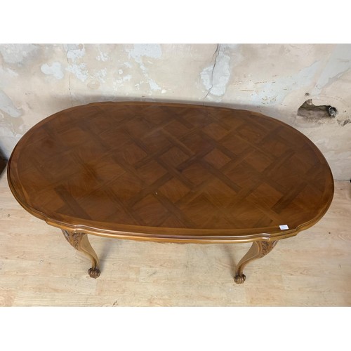 335 - A BEAUTIFULLY CARVED WALNUT CENTRE TABLE WITH 2 EXTRA LEAFS IN DRAWLEAF FORM