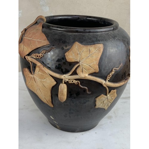 351 - A POTTERY VASE