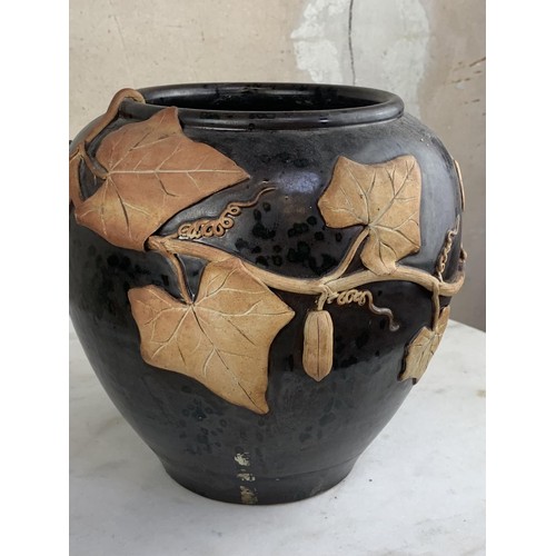 351 - A POTTERY VASE