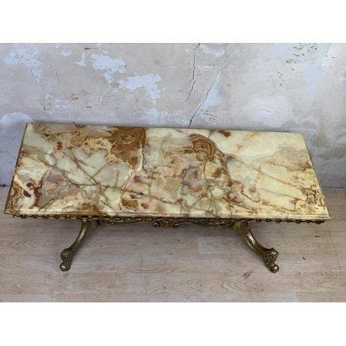 354 - A BRASS AND MARBLE COFFEE TABLE