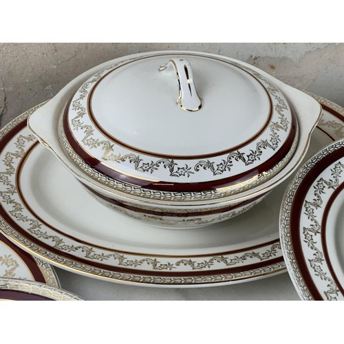 107 - A PART DINNER SERVICE BY MADDOCK TO INCLUDE TUREENS