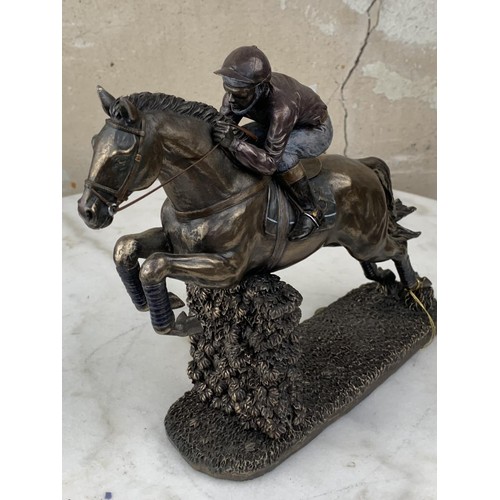 382 - A BRONZE FINISH HORSE AND JOCKEY 9