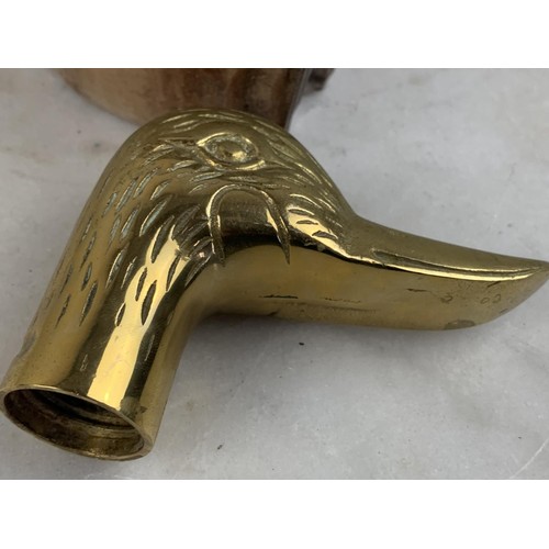 383 - A HORSE SHOE PIPE BOWL AND BRASS DUCK HEAD HANDLE