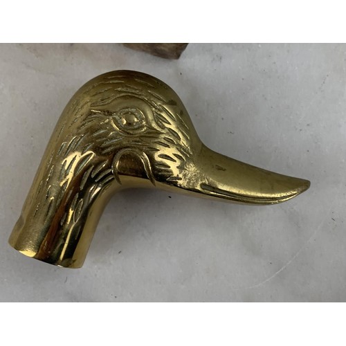 383 - A HORSE SHOE PIPE BOWL AND BRASS DUCK HEAD HANDLE