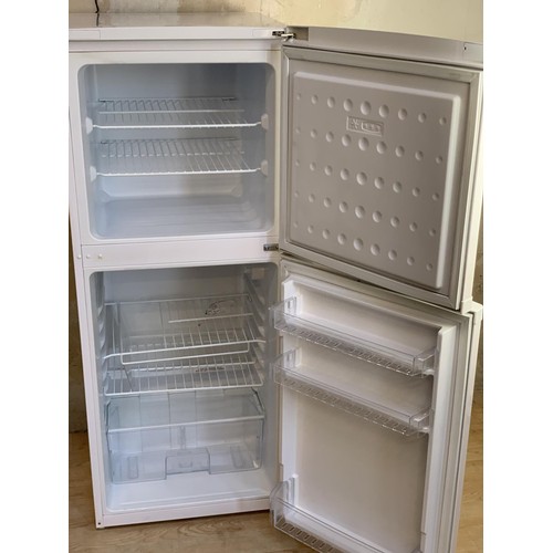 131 - A BEKO FRIDGE FREEZER PWO