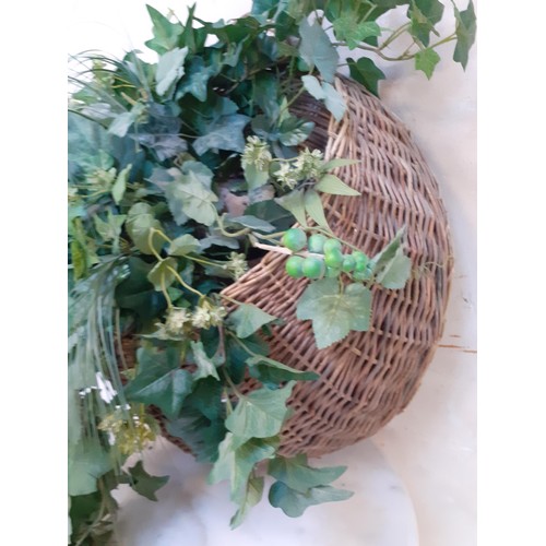 417 - HANGING WICKER BASKET WITH GREENARY