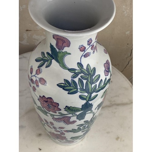 393 - A GLAZED POTTERY VASE