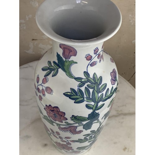 393 - A GLAZED POTTERY VASE