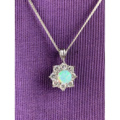 284 - SILVER OPAL GEM SET PENDANT ON A SILVER CHAIN