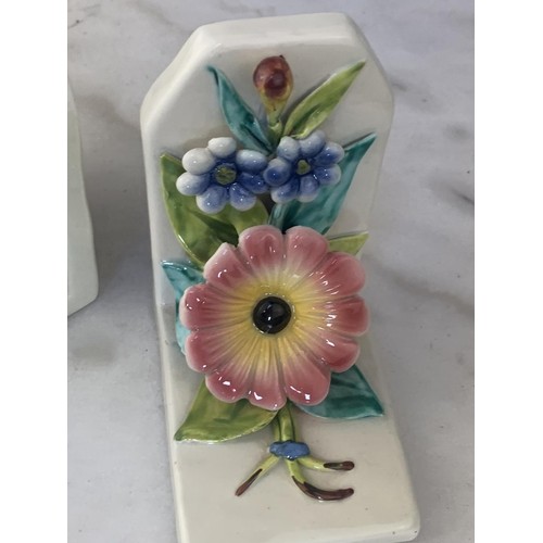 430 - A PAIR OF FLORAL PORCELAIN BOOKENDS