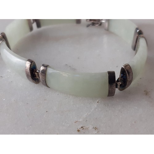 288 - A SILVER AND JADE BRACELET