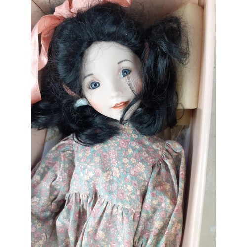 329 - BOXED COLLECTABLE DOLL