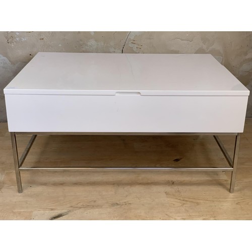 160 - A WHITE HIGH GLOSS COFFEE TABLE WITH METAMORPHIC STORAGE 36x18x26