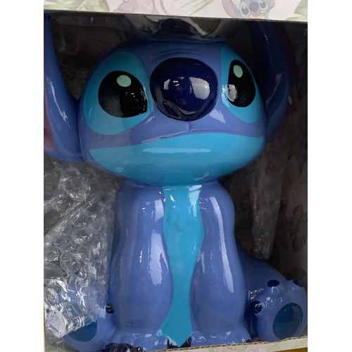 493 - A NEW DISNEY MONEY BOX FROM LILO & STITCH