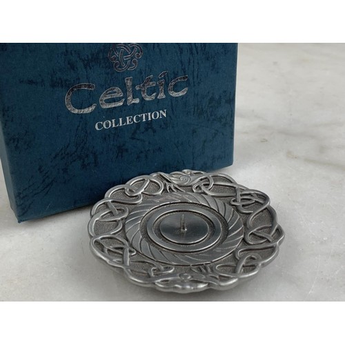 506 - A SMALL BOXED PEWTER CELTIC CANDLE HOLDER