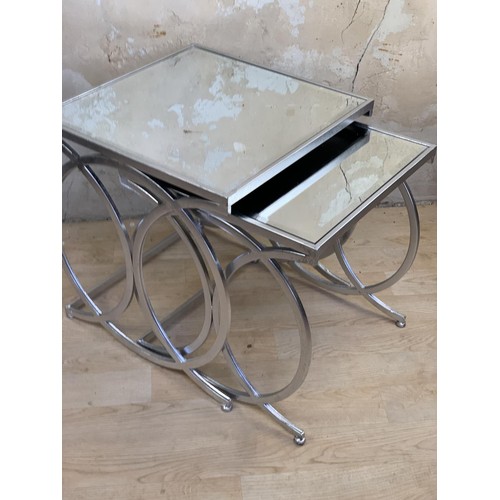 527 - A NEW SET OF CHROME & MIRRORED NEST OF TABLES