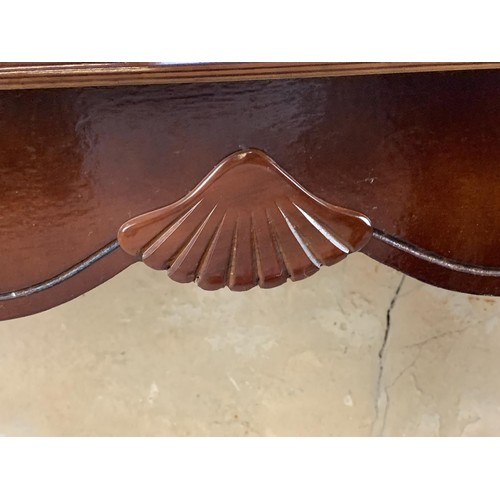 546 - A MAHOGANY CONSOL TABLE WITH SHELL MOTIF