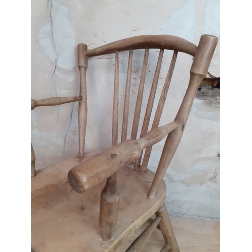 547 - AN OLD STICKBACK ARMCHAIR