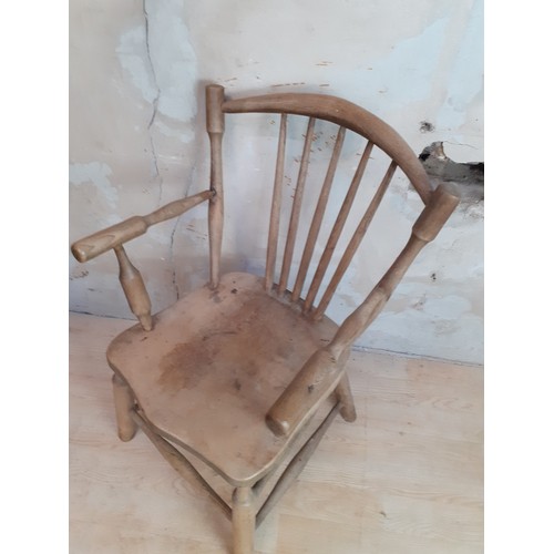 547 - AN OLD STICKBACK ARMCHAIR