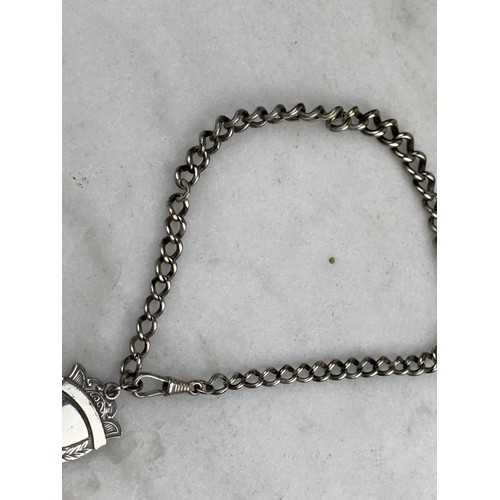 557 - A WHITE METAL WATCH CHAIN (PLATED ) WITH MEDAL