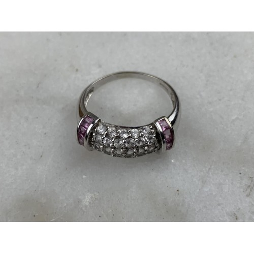 590 - 9ct WHITE GOLD WHITE SAPPHIRE AND RUBY RING