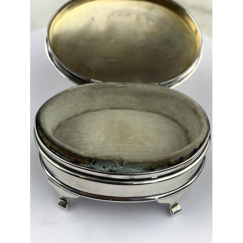 597 - A BIRMINGHAM SILVER TRINKET BOX SET ON 4 FEET