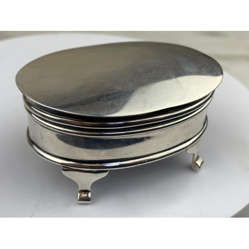 597 - A BIRMINGHAM SILVER TRINKET BOX SET ON 4 FEET