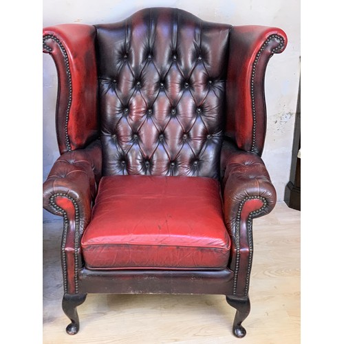 611 - PAIR OXBLOOD BUTTONED WINGBACK ARMCHAIRS