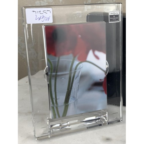 621 - A WATERFORD CRYSTAL PHOTO FRAME BOXED 6 x 8