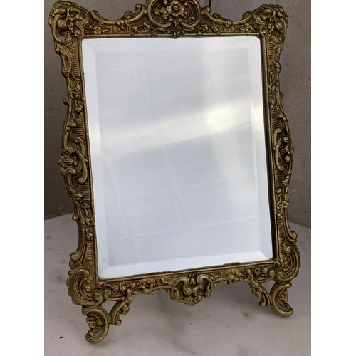 641 - A GILT FRAMED DRESSING MIRROR APPROX 14X10