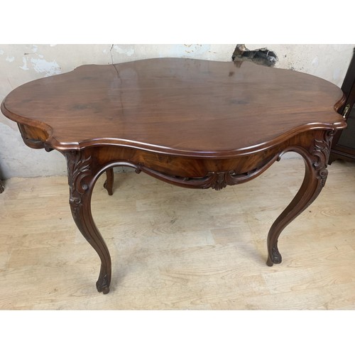 647 - 19TH CENTURY SHAPED CARVED MAH CENTRE TABLE