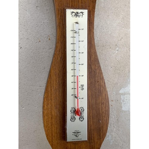 692 - AN OAK CASED BAROMETER 19