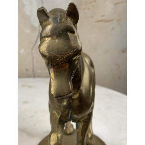 695 - A HEAVY BRASS HORSE FIGURE 9